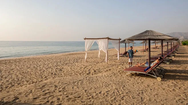 Private sunbeds on  Fujairah Beach near Miramar Al Aqah Beach Resort