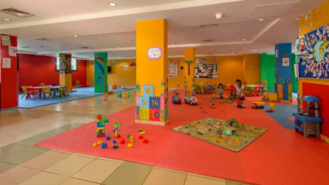 Indoor kids club with toys at Miramar Al Aqah Beach Resort